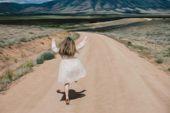 Child skipping down road in Wyoming