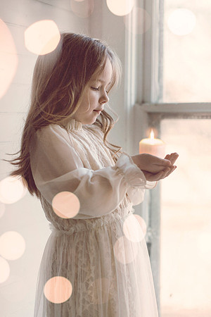 Girl with candle